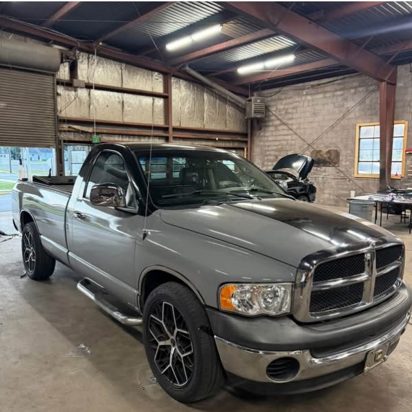 Gloss Nardo grey Ram with a black tuxedo hood
